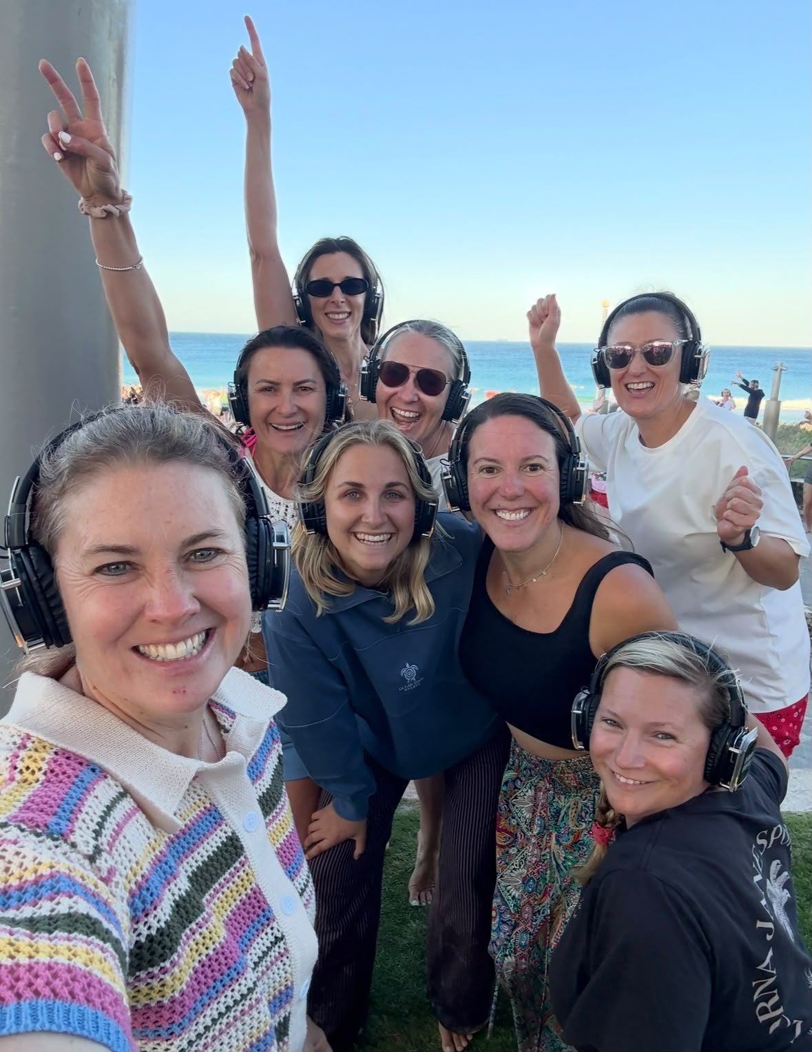 Anne-Marie Grant with a community of women outdoors